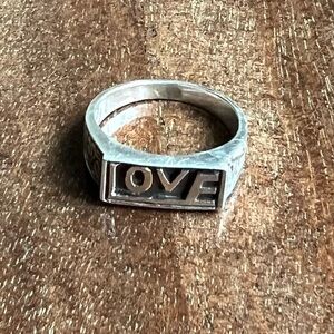 Love carved stamped sterling silver ring